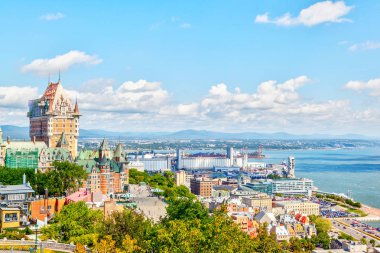 View of Old Quebec skyline and surrounding landscape with Chateau Frontenac, Dufferin Terrace boardwalk and the Saint Lawrence River in Quebec City, Quebec, Canada. clipart