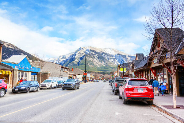CANMORE, CANADA - OCT. 26, 2018: Downtown Main Street in Canmore Kananaskis of the Canadian Rockies. As a gateway to Banff National Park, the mountainous town draws thousands of visitors annually.