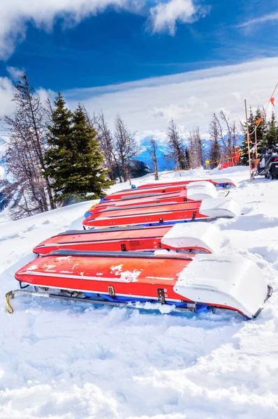 Rows Ski Patrol Toboggans Rescue Sleds Lie Snow Mountain Ski — Stock Photo, Image