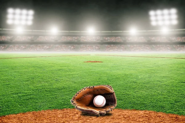 Baseball Glove and Ball on Field in Outdoor Stadium With Copy Space