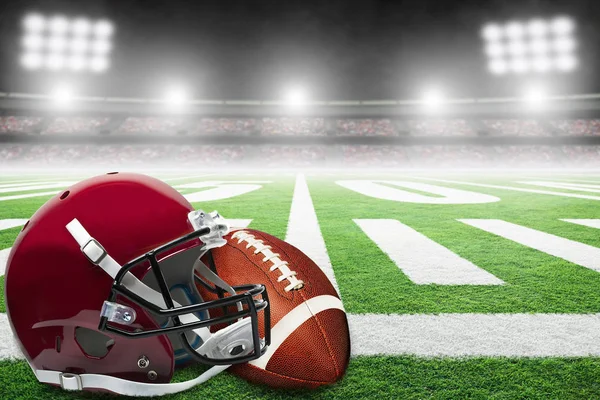 American Football en helm op veld met stadion lichten en co — Stockfoto