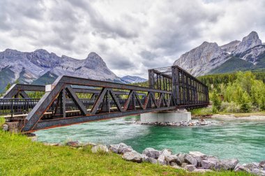 Canmore Engine Bridge Over Bow River Trail in the Canadian Rocki clipart