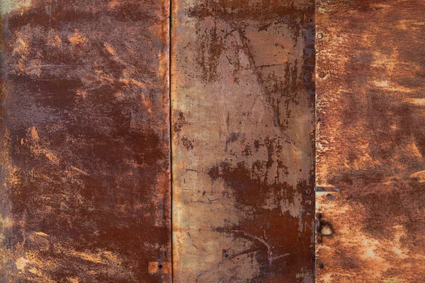 Paslı metal levha duvarının tam ekran dokusu 