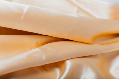 Altın kumaş kıvrımları. perdelik. ipek Parlatıcı. Dikiş