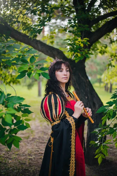 Queen Flute Her Hands Beautiful Girl Crown Plays Pipe Fantasy — Stock Photo, Image