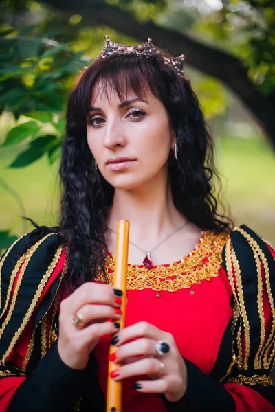 Queen Flute Her Hands Beautiful Girl Crown Plays Pipe Fantasy — Stock Photo, Image