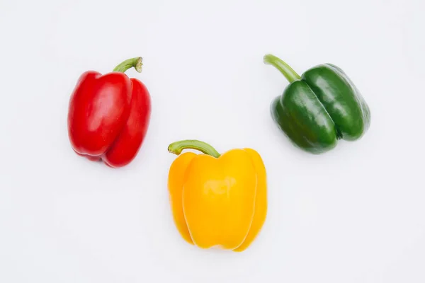 Sweet Pepper Multicolored White Background Red Yellow Green Peppers Lie — Φωτογραφία Αρχείου