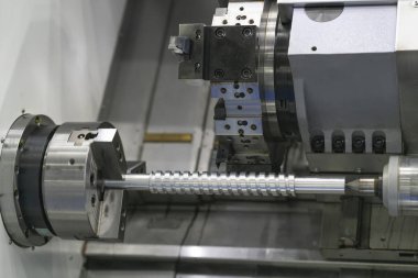 Operator machining automotive part by cnc turning machine, clipart