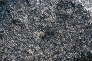 Kaya dokusu arka planı. Doğal taş duvar parçası. Tasarım, arkaplan.