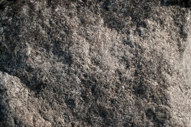 Çiğ gri granit kaya dokusu arka planda. Doğal taş duvar parçası.