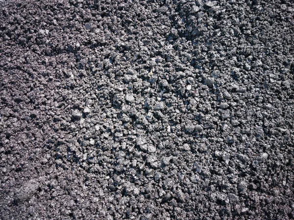 Черная Зернистая Поверхность Фона Легким Пятном Середине — стоковое фото