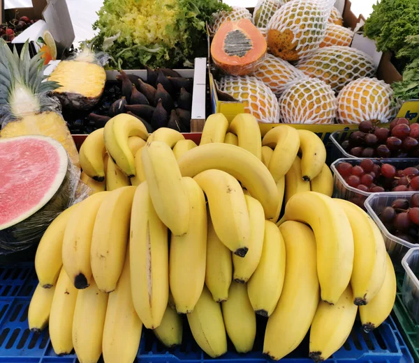 fruit on the market window, bananas, watermelon, papaya, seasonal summer fruit