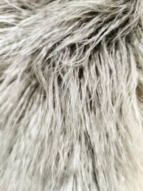 Arka plan için yapay bej uzun kürk tonları dokusu