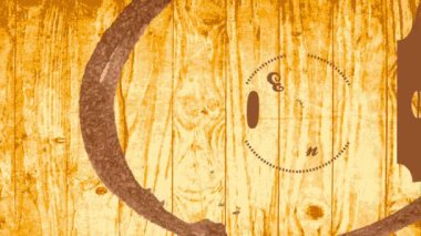 Kahverengi bardak lekesi ve ahşap dokuma sahnesine işlenmiş yuvarlak sembol ile kahve dükkanının reklamını hızla yapan eylemsizlik hareketi