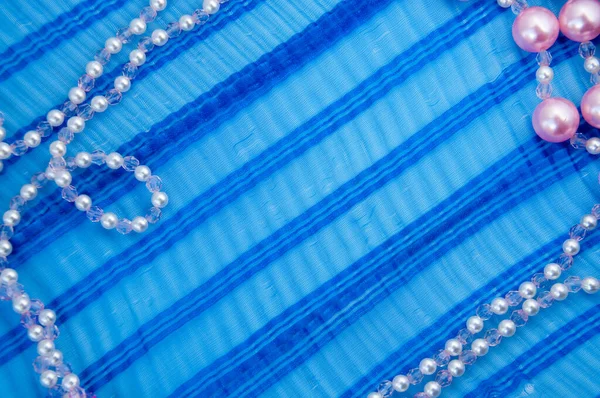 Pattern Strands Pink Pearls Blue Ribbon — Stock Photo, Image