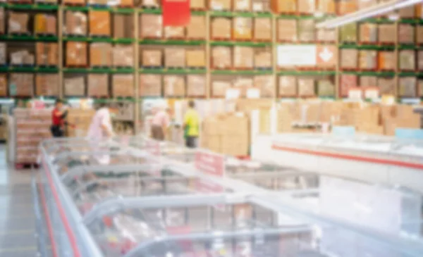 Abstract Blur effect at the warehouse store food with the refrigerator and freeze foods, cartons of foods  for the wholesale customer  and shopper for stockpiling and who buy a lot of the many type.