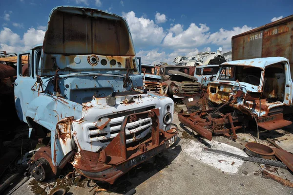 Old abandoned trucks, Buryakovka radioactive vehicles graveyard in Chernobyl, summer season in exclusion Zone, Ukraine