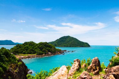 Typical seascape with sand beach. Dramatic summer morning on the east coast of Thailand clipart