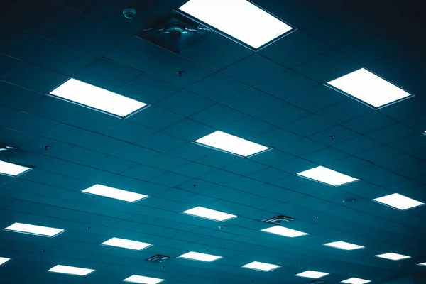 Ceiling and light panel with Fluorescent lamp on the modern ceiling