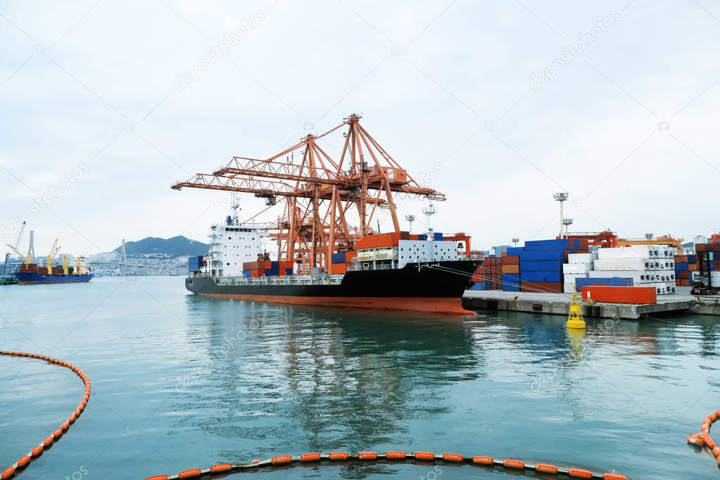 container ship at loading port : Logistics and transportation of International Container Cargo ship ,Freight Transportation, Shipping