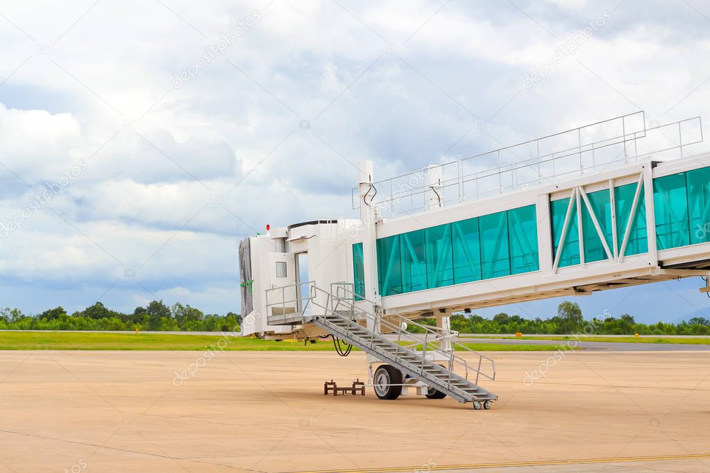 airplane Bridge,walkway in airport for passengers boarding, Jetway waiting for a plane to arrive on airport.airport terminal boarding gate.