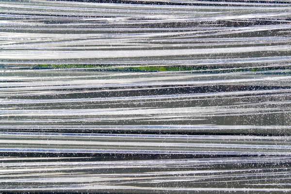 Падіння Води Фоні Пластикового Листа — стокове фото