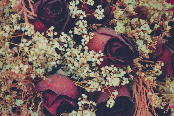 Dry roses in vintage style, selective focus