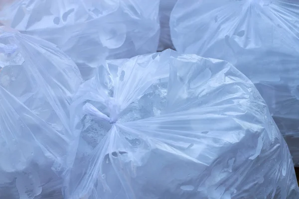 Ice inside plastic bag, closeup view