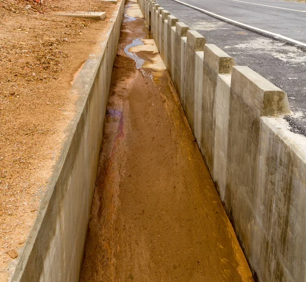 Drainage way concrete roadside drain water used for drainage in — Stock Photo, Image