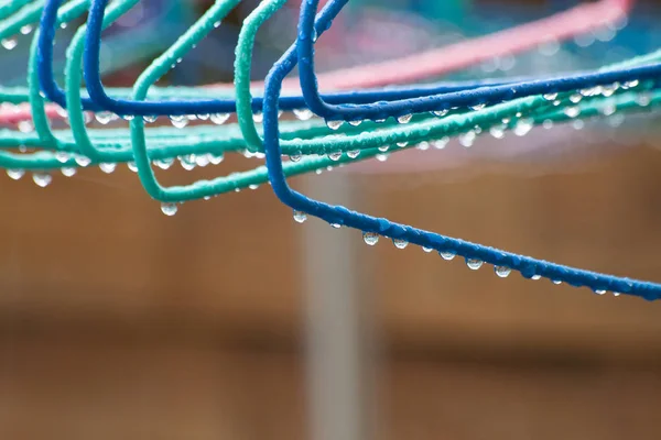 rain on hangers on a rainy day.