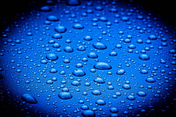 Drops of water on blue floor , abstract of condensation on the f — Stock Photo, Image