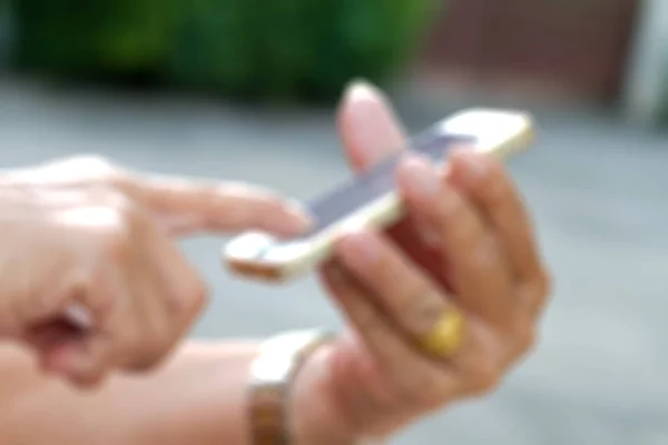 Hand of old man play with old  smartphone phone — Stock Photo, Image