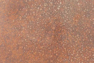 Eski paslı rögar kapağının resmini kapat; demirin paslı dokusu ve fotokopi alanı, aşınma deseni arka plan olarak