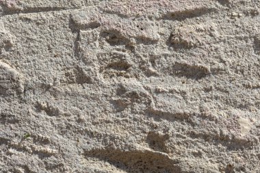 Gri desenli beton duvarı kapat; beton duvarın kaba yüzeyinin ayrıntıları