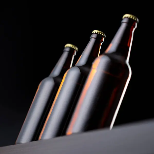 Low Angle View Three Bottles Cold Beer Row Bar Counter — Stock Photo, Image