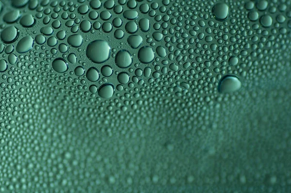 Schöner Hintergrund Mit Wassertropfen Grünem Licht Ähnlich Wie Granatapfelfrüchte — Stockfoto