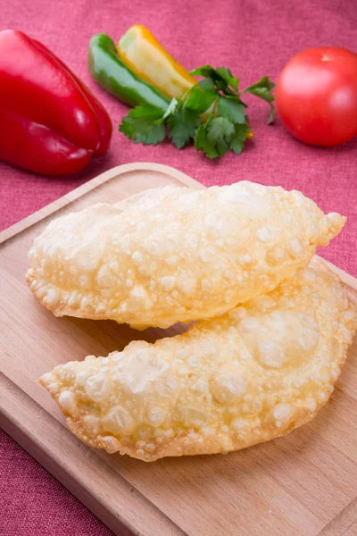 Fried stuffed asian dough bread stuffed with cheese or meat — Stock Photo, Image