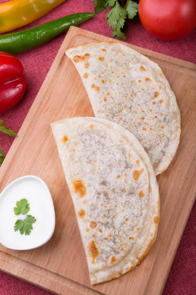 Fried stuffed asian dough bread stuffed with cheese or meat — Stock Photo, Image