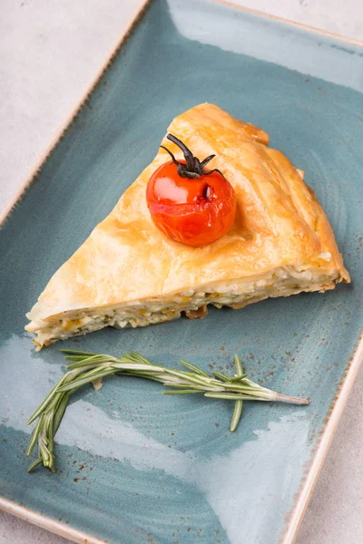 Slice of traditional cheese and herb pie — Stock Photo, Image
