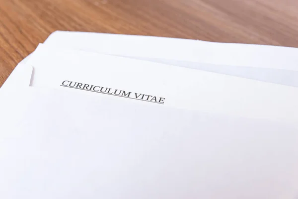 Curriculum vitae in an envelope; send and receive a vurriculum vitae