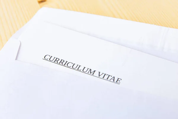Curriculum vitae in an envelope; send and receive a vurriculum vitae