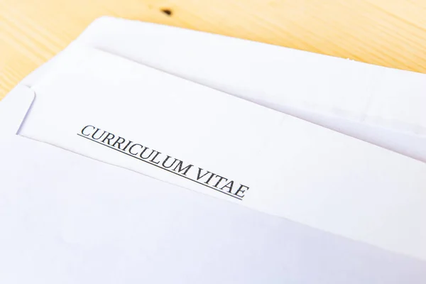 Curriculum vitae in an envelope; send and receive a vurriculum vitae