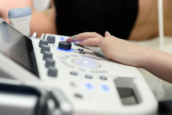 Female Doctor Working Modern Ultrasound Machine Clinic Lose Focus Hands — Foto Stock