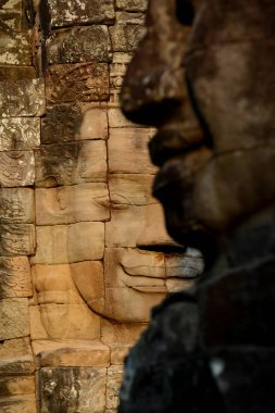 Taş Bayon tapınakta Tempel kalıntıları, Angkor Thom Temple City Angkor Kamboçya Batı yakınındaki Siem Reap şehir içinde yüz.