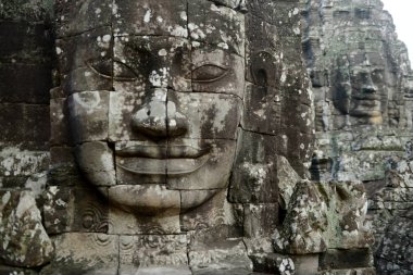 Taş Bayon tapınakta Tempel kalıntıları, Angkor Thom Temple City Angkor Kamboçya Batı yakınındaki Siem Reap şehir içinde yüz.