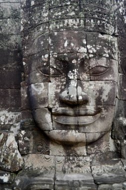 Taş Bayon tapınakta Tempel kalıntıları, Angkor Thom Temple City Angkor Kamboçya Batı yakınındaki Siem Reap şehir içinde yüz.