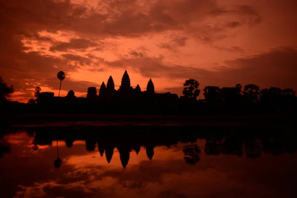 Sunrise at the Angkor Wat Temple in the Temple City of Angkor near the City of Siem Reap in the west of Cambodia.