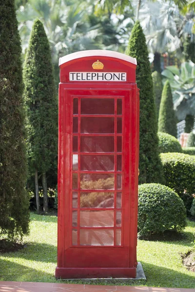 a british telephone cabin at the nong nooch tropical garden near the city of Pattaya in the Provinz Chonburi in Thailand.  Thailand, Pattaya, November, 2018