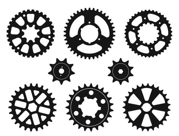 Silhouettes of the gear wheels, vector icons set — Stock Vector