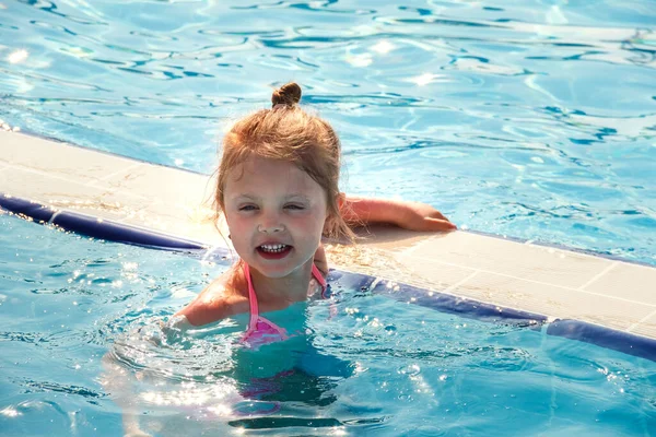 Little Happy Girl Swims Pool Summer Vacation Afternoon Child Enjoys Royalty Free Stock Images